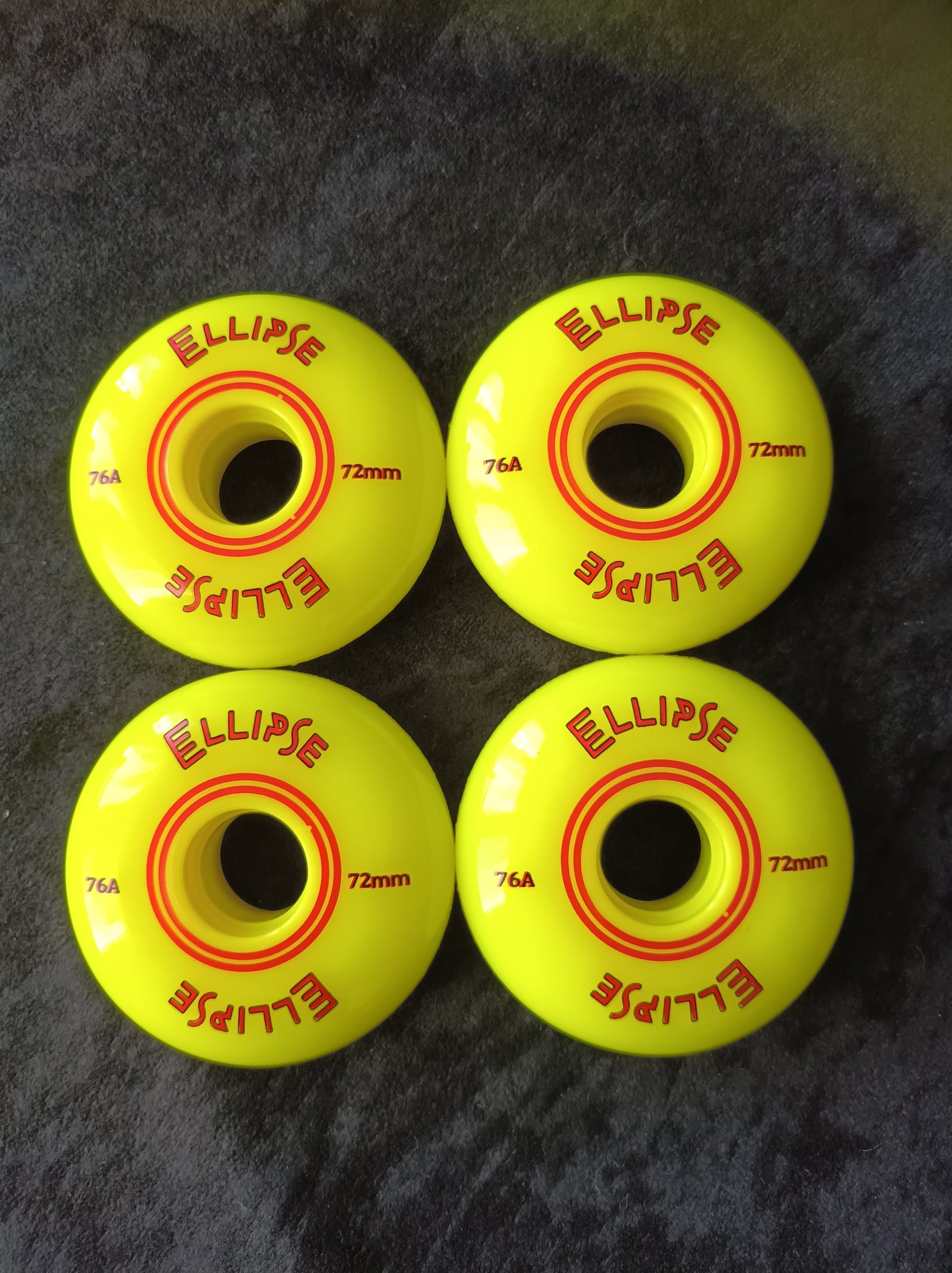 Roue de roller hockey Ellipse jaune 72mm dureté 76A pour adhérence maximale.